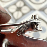 Antique bow brooch with surfite heart