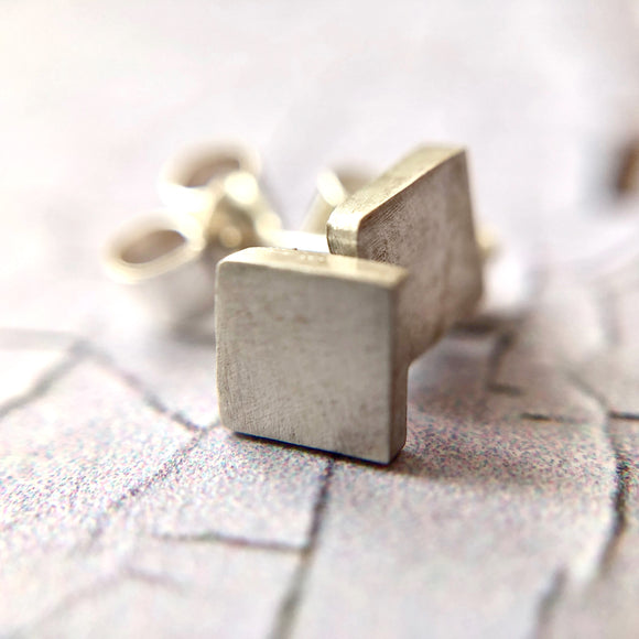 silver square studs